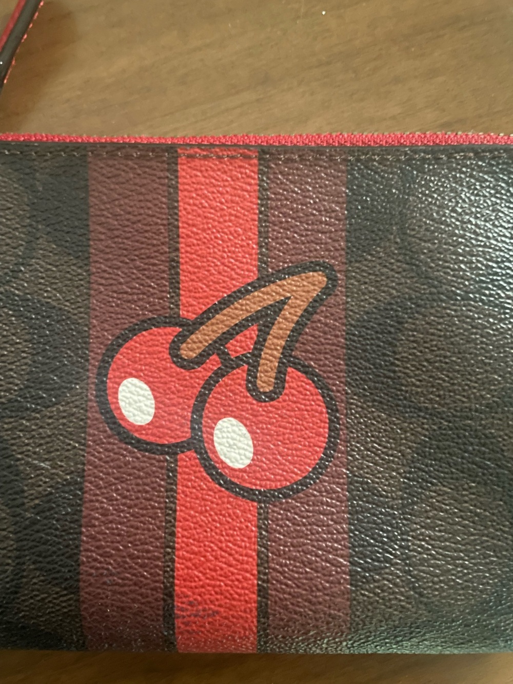 Coach x Pac-Man logo print coated Cherry Stripe Wristlet